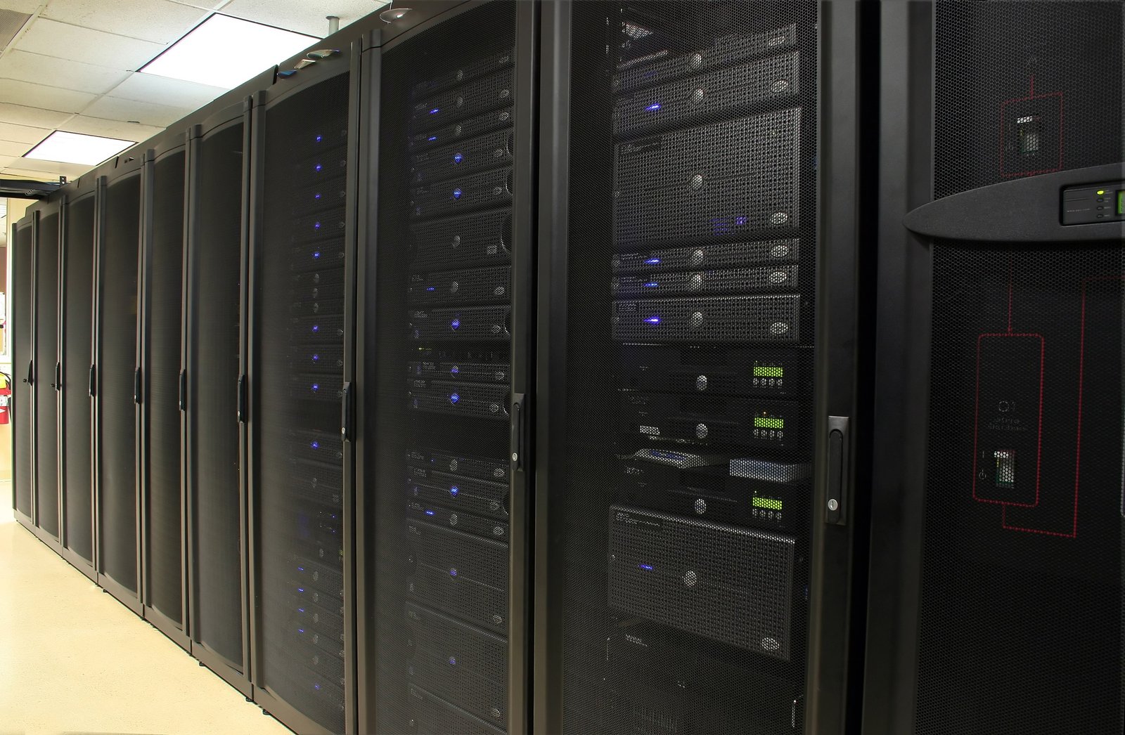 Rows of server racks in a data center.